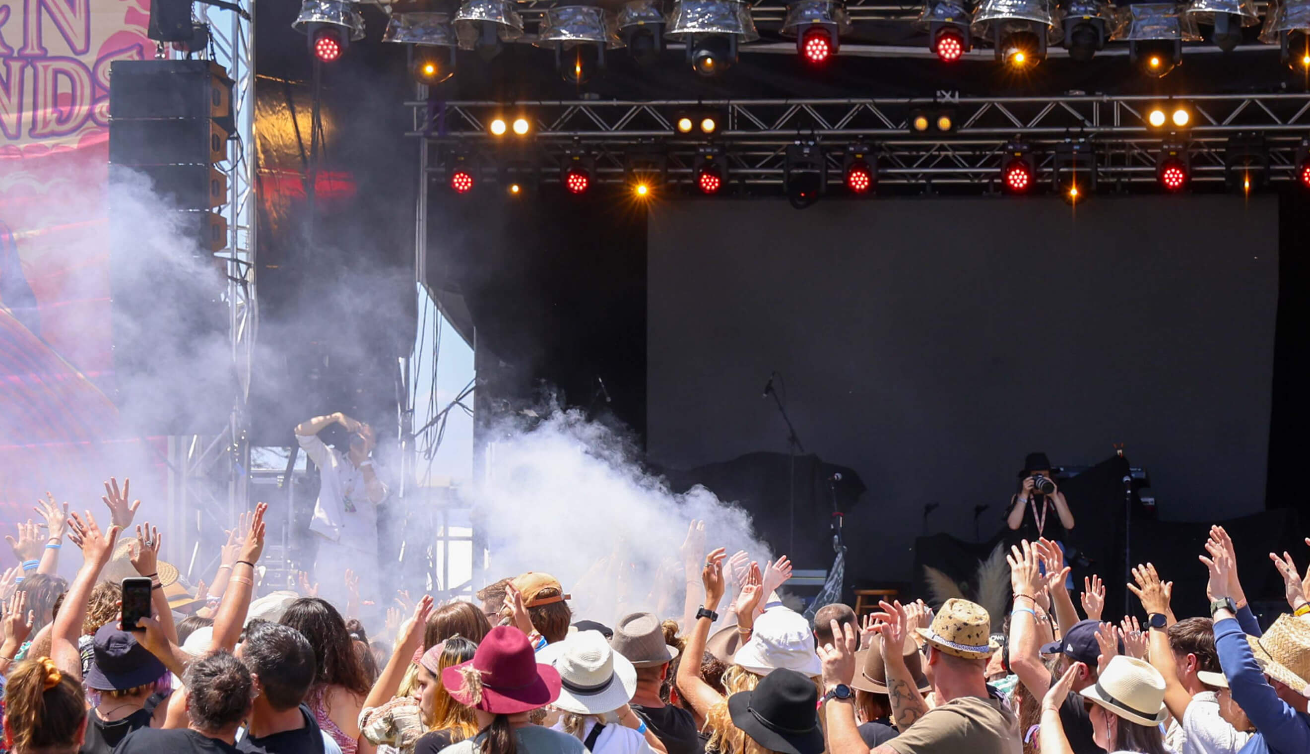 Crowd in front of stage with smoke machine