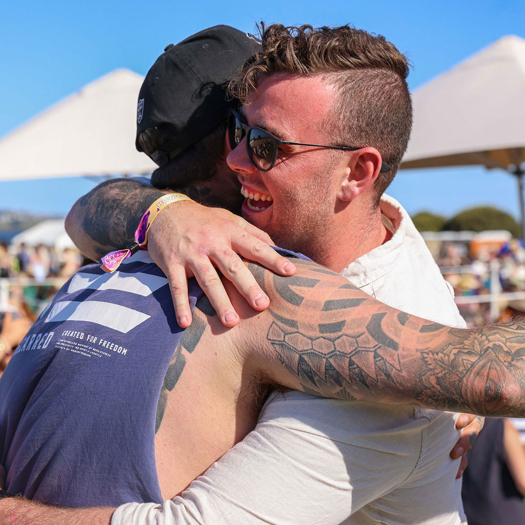 festival goers embracing